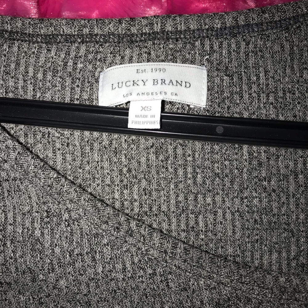 Long sleeved knitted half cold shoulder top